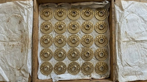 Sand cast solid brass doorbell surrounds 